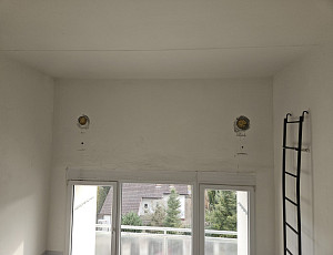 Zateplení dutiny panelového domu pomocí foukané izolace